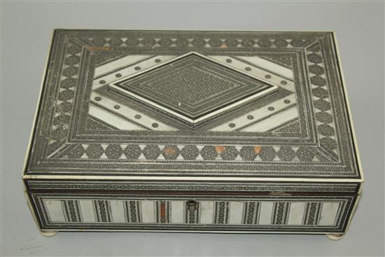 An Indian ivory and sadeli rectangular work box, 11in.